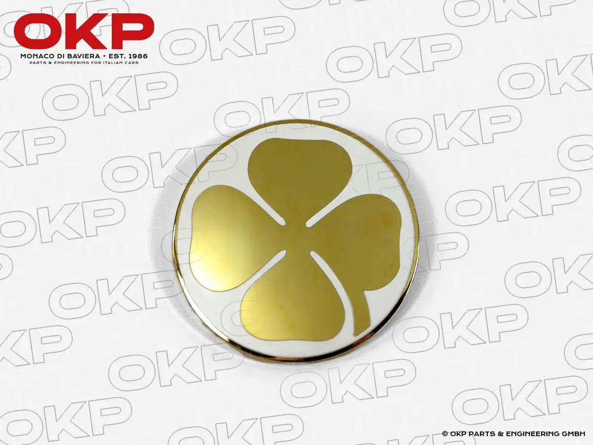 Golden cloverleaf badge on c - pillar right / left