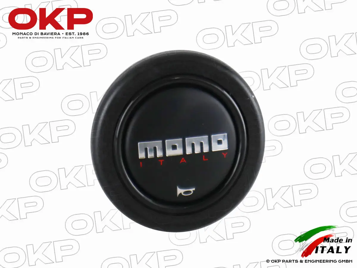 MOMO Hupenknopf Logo schwarz